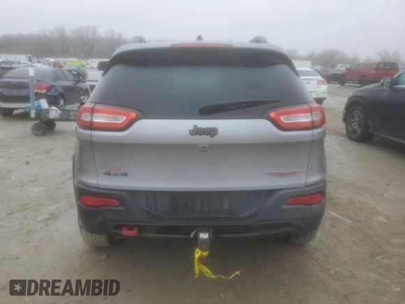 2014 Jeep Cherokee Trailhawk with VIN 1C4PJMBS1EW240177, listed as a Copart auction lot 43321715 with 212,339 mi miles and Salvage title. Bid and sale history available at DreamBid. Image 6.