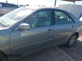 2005 Toyota Camry LE z VIN 4T1BE30K65U592500, wystawiony jako IAAI lot #42373718 z przebiegiem 189 054 mil mil oraz . Historia ofert i sprzedaży dostępna na DreamBid. Obrazek 14.