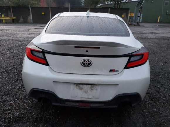 2022 Toyota GR86 Premium with VIN JF1ZNBE17N9757637, listed as a Copart auction lot 82174084 with 73,316 mi miles and Salvage Title. Bid and sale history available at carsss.com. Image 6.