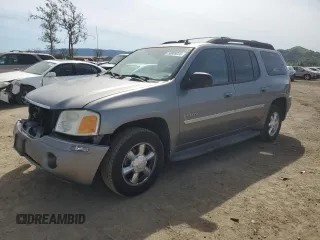 2006 GMC Envoy SLE z VIN 1GKES16S766138918, wystawiony jako Copart lot #50089225 z przebiegiem 169 795 mil mil oraz Szkoda całkowita • Salvage title. Historia ofert i sprzedaży dostępna na DreamBid. Obrazek 1.