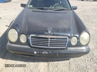 1997 Mercedes-Benz E-Class with VIN WDBJF72F0VA189407, listed as a Copart auction lot 76073234 with 114,692 mi miles and Salvage Title. Bid and sale history available at carsss.com. Image 11.