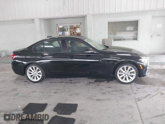 2018 BMW 3 Series 320i with VIN WBA8E1G54JNU90018, listed as a IAAI auction lot 42236134 with 73,589 mi miles and . Bid and sale history available at DreamBid. Image 14.