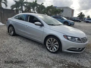 2013 Volkswagen CC VR6 Executive 4Motion with VIN WVWGU7AN2DE513930, listed as a Copart auction lot 86978754 with 0 mi miles and Salvage Title. Bid and sale history available at carsss.com. Image 4.