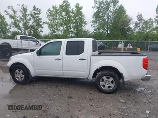 2005 Nissan Frontier LE with VIN 1N6AD07U55C461411, listed as a IAAI auction lot 42322533 with 158,937 mi miles and . Bid and sale history available at DreamBid. Image 14.