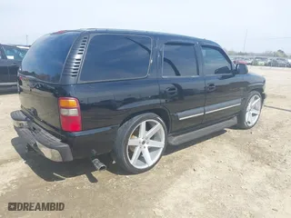 2003 Chevrolet Tahoe LT with VIN 1GNEC13Z73J322783, listed as a IAAI auction lot 41773868 with 259,710 mi miles. Bid and sale history available at carsss.com. Image 4.