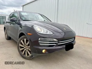 2014 Porsche Cayenne z VIN WP1AA2A25ELA97360, wystawiony jako Copart lot #59060675 z przebiegiem 181 114 mil mil oraz Tytuł czysty. Historia ofert i sprzedaży dostępna na DreamBid. Obrazek 1.