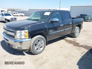 2013 Chevrolet Silverado 1500 LT with VIN 3GCPCSE01DG244414, listed as a IAAI auction lot 41770383 with 162,559 mi miles and . Bid and sale history available at DreamBid. Image 2.
