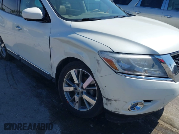 2015 Nissan Pathfinder SL with VIN 5N1AR2MM4FC707351, listed as a IAAI auction lot 42334235 with 124,017 mi miles and . Bid and sale history available at DreamBid. Image 6.