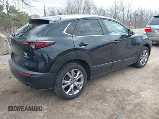 2021 Mazda CX-30 Preferred z VIN 3MVDMBCL5MM205824, wystawiony jako IAAI lot #41991942 z przebiegiem 58 112 mil mil oraz . Historia ofert i sprzedaży dostępna na DreamBid. Obrazek 4.