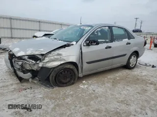 2001 Ford Focus LX with VIN 1FAFP33P11W359944, listed as a Copart auction lot 84024874 with 111,521 mi miles and Non Repairable. Bid and sale history available at carsss.com. Image 1.