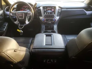 2015 GMC Yukon SLT with VIN 1GKS1BKC9FR144289, listed as a Copart auction lot 42179675 with 122,807 mi miles and Salvage Title. Bid and sale history available at carsss.com. Image 8.