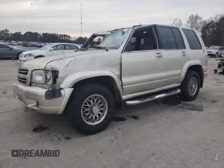 2000 Isuzu Trooper S z VIN JACDJ58X9Y7J18322, wystawiony jako Copart lot #42444695 z przebiegiem 149 799 mil mil oraz Szkody całkowita. Historia ofert i sprzedaży dostępna na DreamBid. Obrazek 1.