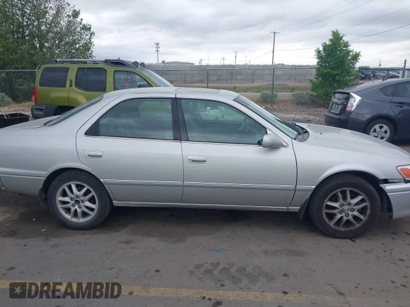 2001 Toyota Camry LE z VIN 4T1BF28K71U127407, wystawiony jako IAAI lot #42247606 z przebiegiem 289 995 mil mil oraz . Historia ofert i sprzedaży dostępna na DreamBid. Obrazek 13.