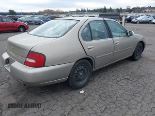 2001 Nissan Altima GXE with VIN 1N4DL01D71C151627, listed as a IAAI auction lot 41632277 with 228,944 mi miles. Bid and sale history available at carsss.com. Image 4.