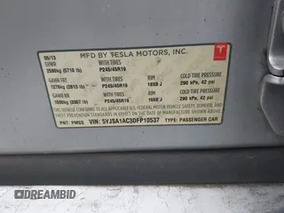 2013 Tesla Model S with VIN 5YJSA1AC3DFP10537, listed as a IAAI auction lot 40707549 with 103,111 mi miles and . Bid and sale history available at DreamBid. Image 9.
