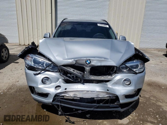 2015 BMW X5 xDrive35i z VIN 5UXKR0C52F0P12247, wystawiony jako Copart lot #54955465 z przebiegiem 87 315 mil mil oraz Szkoda całkowita • Salvage title. Historia ofert i sprzedaży dostępna na DreamBid. Obrazek 5.