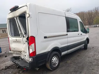 2021 Ford Transit Cargo with VIN 1FTBR2C82MKA29523, listed as a IAAI auction lot 41069336 with 195,397 mi miles and . Bid and sale history available at DreamBid. Image 4.