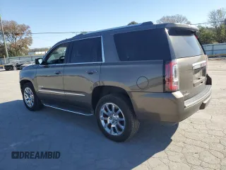 2015 GMC Yukon Denali with VIN 1GKS1CKJ2FR665259, listed as a Copart auction lot 75829894 with 193,376 mi miles and Salvage Title. Bid and sale history available at carsss.com. Image 2.