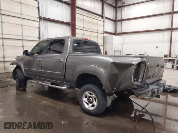 2005 Toyota Tundra SR5 with VIN 5TBDT441X5S474120, listed as a IAAI auction lot 41875834 with 253,304 mi miles and . Bid and sale history available at DreamBid. Image 3.