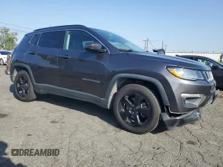 2017 Jeep Compass Latitude with VIN 3C4NJCBB0HT647547, listed as a Copart auction lot 59615635 with 53,827 mi miles and Salvage title. Bid and sale history available at DreamBid. Image 4.