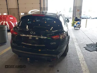 2016 Infiniti QX70 z VIN JN8CS1MW7GM400558, wystawiony jako IAAI lot #40917829 z przebiegiem 149 885 mil mil oraz . Historia ofert i sprzedaży dostępna na DreamBid. Obrazek 16.
