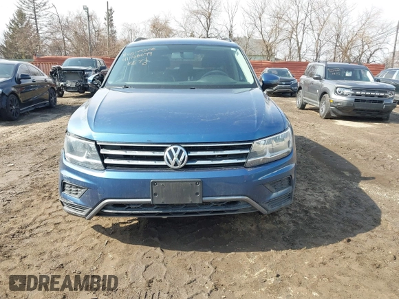 2018 Volkswagen Tiguan S with VIN 3VV1B7AX6JM108786, listed as a IAAI auction lot 41708099 with 162,289 mi miles and . Bid and sale history available at DreamBid. Image 12.