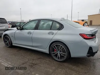 2023 BMW 3 Series 330e xDrive with VIN 3MW39FS05P8C89800, listed as a Copart auction lot 44342255 with 19,562 mi miles and Salvage Title. Bid and sale history available at carsss.com. Image 2.