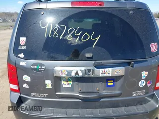 2011 Honda Pilot Touring with VIN 5FNYF4H95BB090892, listed as a IAAI auction lot 41878404 with 131,757 mi miles. Bid and sale history available at carsss.com. Image 16.