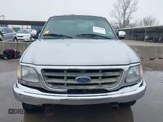 2001 Ford F-150 XL с VIN 1FTRX17L21NA88319, выставлен на аукционе IAAI как лот 41476671 с пробегом Не указан миль и . История ставок и продаж доступна на DreamBid. Изображение 13.