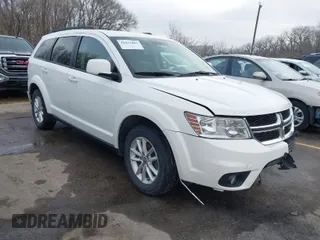 2016 Dodge Journey SXT with VIN 3C4PDCBG0GT206463, listed as a IAAI auction lot 41832864 with 135,409 mi miles. Bid and sale history available at carsss.com. Image 1.