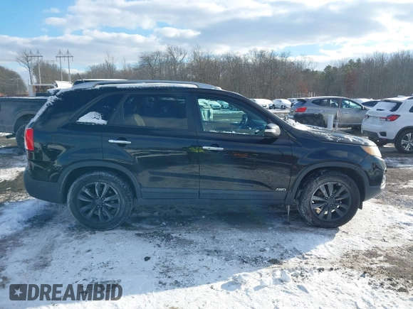 2011 Kia Sorento EX with VIN 5XYKUDA25BG043458, listed as a IAAI auction lot 41363660 with 197,151 mi miles. Bid and sale history available at carsss.com. Image 13.