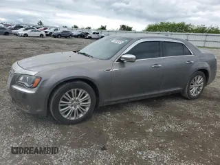 2012 Chrysler 300 Limited with VIN 2C3CCAHG6CH157287, listed as a Copart auction lot 55816345 with 216,514 mi miles and Salvage title. Bid and sale history available at DreamBid. Image 1.