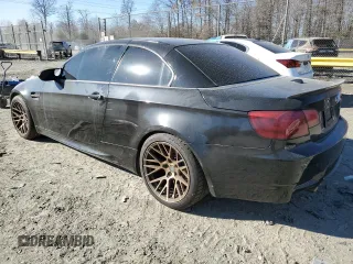 2011 BMW M3 with VIN WBSDX9C52BE584764, listed as a Copart auction lot 83572554 with 138,245 mi miles and Salvage Title. Bid and sale history available at carsss.com. Image 2.