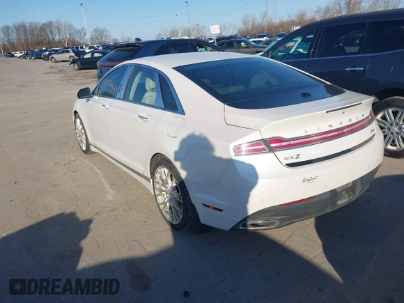 2016 Lincoln MKZ z VIN 3LN6L2JK8GR624664, wystawiony jako IAAI lot #41774444 z przebiegiem 106 695 mil mil oraz . Historia ofert i sprzedaży dostępna na DreamBid. Obrazek 3.