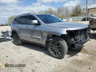 2016 Jeep Grand Cherokee Limited 75th Anniversary with VIN 1C4RJFBG2GC344181, listed as a Copart auction lot 53053525 with 138,726 mi miles and Salvage Title. Bid and sale history available at DreamBid. Image 4.