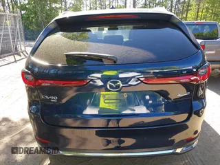 2024 Mazda CX-90 3.3 Turbo Premium with VIN JM3KKDHD3R1133321, listed as a IAAI auction lot 42125203 with 42,023 mi miles. Bid and sale history available at carsss.com. Image 16.