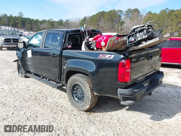 2022 Chevrolet Colorado 4WD Z71 with VIN 1GCGTDENXN1165279, listed as a IAAI auction lot 39042352 with Not provided miles and . Bid and sale history available at DreamBid. Image 3.