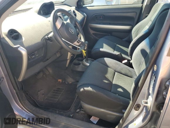 2006 Scion xA z VIN JTKKT624465014796, wystawiony jako Copart lot #70084474 z przebiegiem 156 493 mil mil oraz Szkoda całkowita • Salvage title. Historia ofert i sprzedaży dostępna na DreamBid. Obrazek 7.