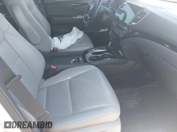 2019 Honda Passport Elite z VIN 5FNYF8H0XKB000774, wystawiony jako IAAI lot #42153669 z przebiegiem 65 415 mil mil oraz . Historia ofert i sprzedaży dostępna na DreamBid. Obrazek 5.