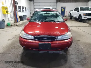 1998 Ford Contour z VIN 3FAFP66LXWM119339, wystawiony jako Copart lot #55103505 z przebiegiem 72 032 mil mil oraz Tytuł czysty. Historia ofert i sprzedaży dostępna na DreamBid. Obrazek 5.