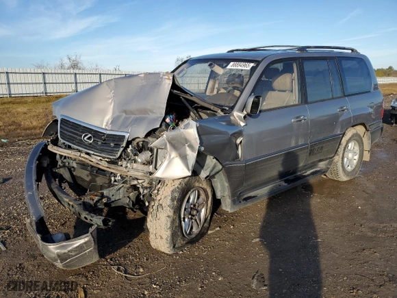 1999 Lexus LX 470 Luxury SUV with VIN JT6HT00W6X0067685, listed as a Copart auction lot 88894965 with 0 mi miles and Salvage Title. Bid and sale history available at carsss.com. Image 1.