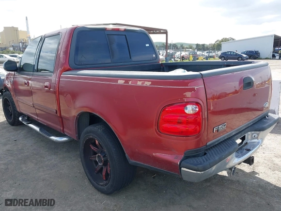 2001 Ford F-150 SuperCrew XLT with VIN 1FTRW07L71KD64069, listed as a IAAI auction lot 41914660 with 1 mi miles. Bid and sale history available at carsss.com. Image 3.