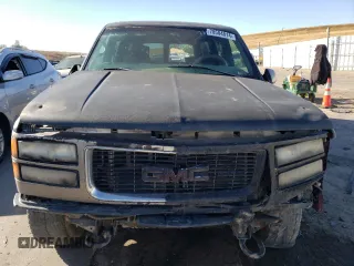 1997 GMC Suburban z VIN 3GKFK16R3VG511306, wystawiony jako Copart lot #78504814 z przebiegiem 287 079 mil mil oraz Szkoda całkowita • Salvage title. Historia ofert i sprzedaży dostępna na DreamBid. Obrazek 5.