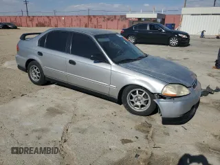 1998 Honda Civic LX z VIN 2HGEJ6576WH566858, wystawiony jako Copart lot #63260834 z przebiegiem 225 031 mil mil oraz Szkoda całkowita • Salvage title. Historia ofert i sprzedaży dostępna na DreamBid. Obrazek 4.