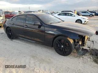 2014 BMW 6 Series 650i z VIN WBA6B2C53ED129256, wystawiony jako Copart lot #85346084 z przebiegiem 51 948 mil mil oraz Szkoda całkowita • Salvage title. Historia ofert i sprzedaży dostępna na DreamBid. Obrazek 4.