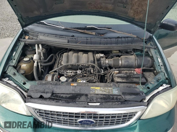 2003 Ford Windstar SEL with VIN 2FMDA53463BA05230, listed as a Copart auction lot 81296344 with 184,585 mi miles and Salvage title. Bid and sale history available at DreamBid. Image 12.