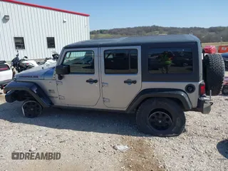 2015 Jeep Wrangler Unlimited Sport z VIN 1C4BJWDG0FL745533, wystawiony jako IAAI lot #41844126 z przebiegiem 151 620 mil mil oraz . Historia ofert i sprzedaży dostępna na DreamBid. Obrazek 15.