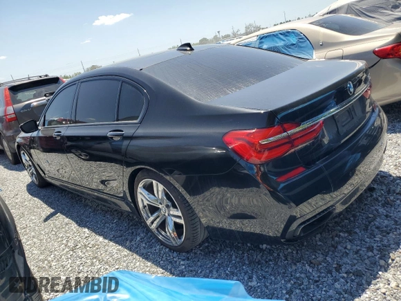 2016 BMW 7 Series 740i with VIN WBA7E2C52GG504096, listed as a Copart auction lot 49258935 with 111,267 mi miles and Salvage Title. Bid and sale history available at carsss.com. Image 2.