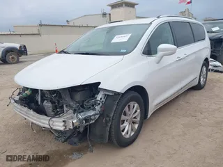 2019 Chrysler Pacifica Touring L with VIN 2C4RC1BG0KR560091, listed as a IAAI auction lot 41694927 with 120,225 mi miles. Bid and sale history available at carsss.com. Image 18.