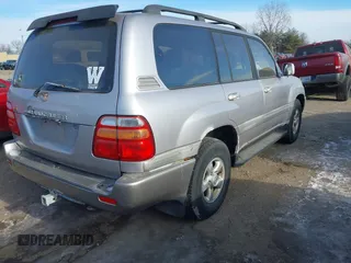 1999 Toyota Land Cruiser with VIN JT3HT05J2X0038906, listed as a IAAI auction lot 41245814 with 1 mi miles. Bid and sale history available at carsss.com. Image 4.